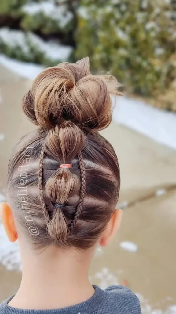 Intertwined Braids into a Neat Bun Dance Hairstyle